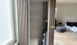 Meterkast wegwerken met akoestische wandpanelen