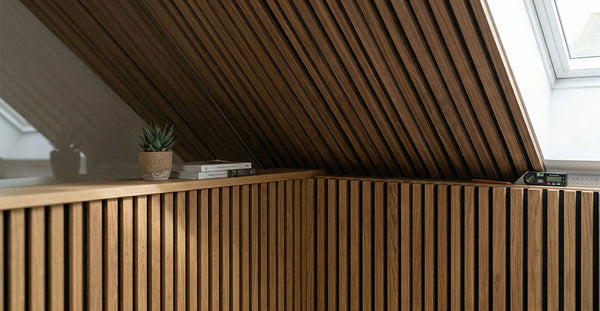 Wood slat panels on a sloped wall: planning an attic feature