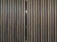 Adeqo sierstrip Zwart van 120 cm in de wand van een akoestisch wandpaneel